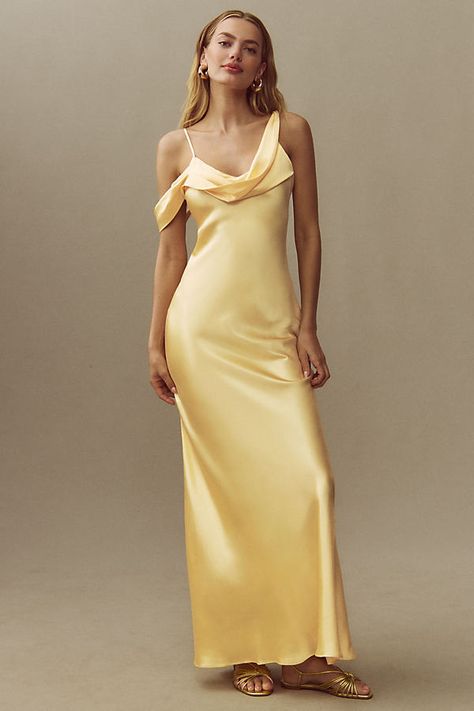 The Reformation Ronda Asymmetrical Cowl-Neck Silk Maxi Dress exudes effortless elegance with its column silhouette, featuring a chic cowl neckline that's enhanced by its luxurious silk charmeuse fabric. | Ronda Asymmetrical Cowl-Neck Silk Maxi Dress by Reformation in Yellow, Women's, Size: 8 at Anthropologie Pastel Yellow Bridesmaid Dresses, Pale Yellow Bridesmaid Dresses, Different Bridesmaid Dresses, Silk Yellow Dress, Silk Prom Dress, Charmeuse Fabric, The Reformation, Yellow Bridesmaid Dresses, Maid Of Honour Dresses