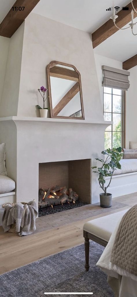 Cast Stone Fireplace Ideas, Spanish Fireplace Mantle, Tile Under Fireplace, French Provincial Fireplace Mantels, Meditteranean Fireplace, Architectural Digest Fireplace, Minimalist Spanish Interior, French Modern Fireplace, California Casual Fireplace