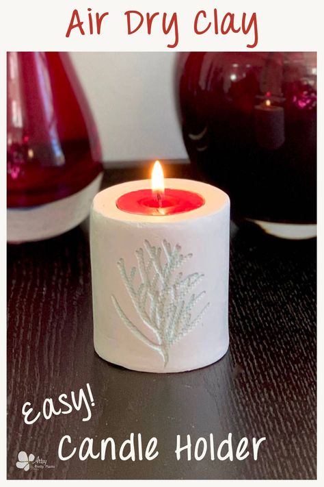 Learn how to make this neat air dry clay candle holder with a cedar leaf imprint. An easy step by step tutorial for making this as a handmade Christmas gift. #artsyprettyplants #claycrafts #diyhomedecor #holidaycrafts Tea Light Holder Ideas, Dry Clay Candle Holder, Air Dry Clay Candle, Clay Tea Light Holder, Air Dry Clay Candle Holder, Clay Candle Holders Diy, Diy Taper Candles, Clay Candle Holders, Clay Christmas Decorations