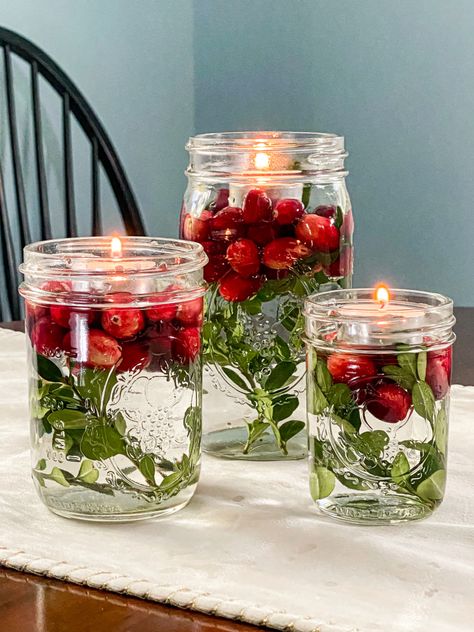 Simple DIY Christmas Crafts - My Family Thyme Floating Candles Cranberries, Cranberry Floating Candles, Floating Cranberries Centerpiece, Christmas Floating Candle Ideas, Easy Xmas Centerpieces, Floating Candle Christmas Centerpieces, Diy Table Centerpieces Christmas, Cheap Christmas Centerpieces Diy, Floating Candle Christmas