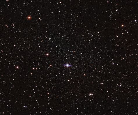 The Carina Dwarf Galaxy is so diffuse it's difficult to see, even though it's one of the nearest galaxies to our own. (Credit: ESO/G. Bono & CTIO) Colour Background, Music Backgrounds, Galaxies Stars, Wallpaper Black, Light Year, Dark Matter, Nice Things, Milky Way, Outer Space