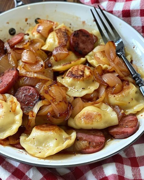 Skillet Pierogies and Kielbasa Pierogi Kielbasa Cabbage, Pierogi And Cabbage, Sauerkraut And Pierogies, Kielbasa Onions And Potatoes, Perogies Kielbasa Recipe, How To Prepare Perogies, Kielbasa And Pierogie Bake, Pierogi And Meatball Skillet, Potato And Kielbasa Recipes