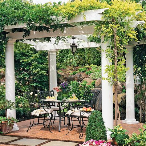 While a pergola probably won't block out your entire yard, it's a great solution for adding privacy to a smaller space. White Pergola, Small Pergola, Patio Pergola, Pergola Design, Wooden Pergola, Backyard Pergola, Tables And Chairs, Pergola Plans, Diy Pergola