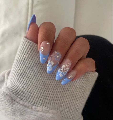 There's a new beauty trend taking over Instagram and it's absolutely stunning. Say hello to "quartz nails". Nail Inspo Ideas Acrylic, Blue Nails Hibiscus, Blue Floral Nails Acrylic, Blue Almond Nails With Flowers, Hibiscus Flower Nail Designs, Baby Blue Hibiscus Nails, Nail Designs Pink And Green, Summer Nail 2024 Trends Blue, Chrome Nails With Flowers