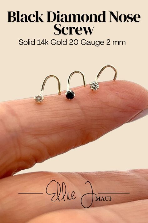 Elevate your nose piercing with this sleek 14k gold black diamond nose screw. Featuring a 2mm black diamond stud and crafted in solid gold, this 20 gauge nose screw adds a bold yet elegant touch to your look. Perfect for those who love unique and minimalist jewelry.

#BlackDiamondNoseStud #GoldNoseScrew #MinimalistJewelry #DiamondNoseRing #BoldJewelry Diamond Nose Ring, Nose Screw, Black Diamond Studs, Bold Jewelry, Nose Ring Stud, Nose Stud, Diamond Stud, Nose Piercing, Diamond Studs