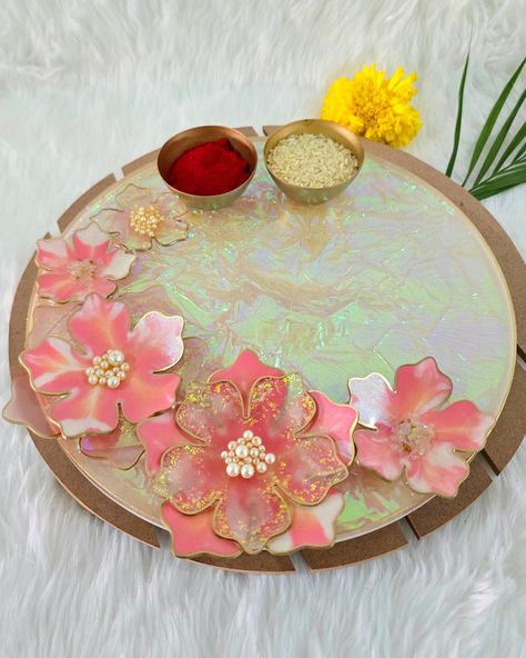 ✨️✨️ Resin Pooja Plates/ Thalis ✨️✨️ Festivities are just around the corner, and these resin plates are definitely going to make your festivals even more beautiful & pretty and add that touch of elegance and asthetics!! *** Handmade and unique! * Designs & colour pallette can be customized as per your choice and requirements! * Great for gifting, return favours & personal use * Shipping available across India We also have Resin Tilak platters for sending across to your bhai or Bhai-Bhabhi... Rakshabandhan Hampers, Resin Plates, Return Favours, Diwali Gif, Rakhi Gifts For Sister, Gift For Brother, Gift Hampers, Around The Corner, Corporate Gifts