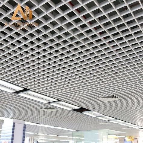 Aluminum grid ceiling system is an open decorative suspended ceiling combined cross-crossing assembled grille main bones and auxiliary bone. Metal Grid Ceiling, Grid Ceiling Design, Suspended Ceiling Tiles, Grid Ceiling, Baffle Ceiling, Stainless Steel Fabrication, Aluminum Ceiling, Ceiling Materials, Metal Grill