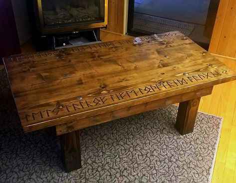 Impressive coffee table decorated with Runes. Cool eh! #instacoffee #coffeetable #runes #vikingstyle #vikingsofinstagram #vikinglifestyle #vikinglife #vikinginspired #thevikingway #vikinghomes #vikingfurniture Viking Decor Interior Design, Viking Dinner, Carved Coffee Table, Cordwood Homes, Viking House, Viking Decor, Dinner Table Decor, Nordic Decor, Viking Style