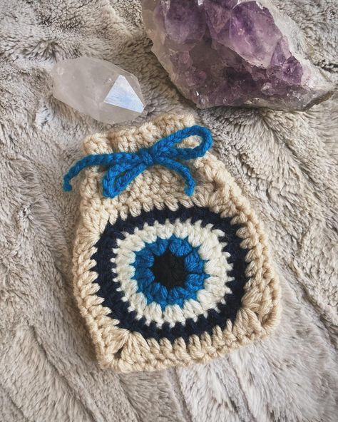 I finally got the pattern for my Evil Eye Protection Drawstring Pouch up on Etsy! 🧿 • • • #crochet #crochetpattern #etsy #etsyshop #theweavingwitchery #crochetbag #crochetbagpatterns #crochetevileye #evileyeprotection #evileyebag #witchy Crochet Witchy Stuff, Witchy Crochet Patterns, Witchy Crochet, Crochet Tarot, Advanced Crochet, Evil Eye Protection, Crochet Goodies, Crochet Stuff, Drawstring Pouch