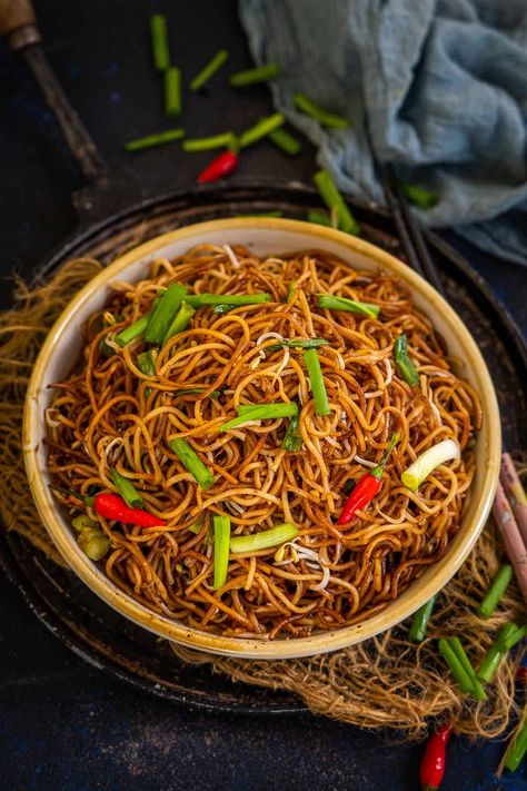 These crispy Cantonese Style Pan Fried Noodles are packed with flavors and come together in under 20 minutes. Make this favorite Asian restaurant version at home using my easy recipe. Yummy Asian Food, Fried Noodles Recipe, Pan Fried Noodles, Crispy Noodles, Authentic Asian Recipes, Asian Restaurant, Brunch Spread, Fried Noodles, Chicken Thigh Recipes Crockpot