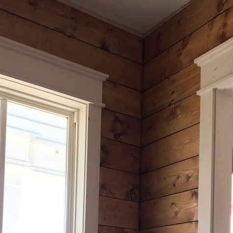 Janea Spades on Instagram: "I can’t even express how thrilled I am with the decision to stain the shiplap in one room! Wish I had a couple of other places unpainted to do this - but so glad to have it here! 😍 The wood is pine and the stain is Provincial by Minwax @tridantbuilders ripped every single board to make this happen. 👏🏻#spadesfourgables #tridantbuilders #mitchginndesign #fourgables #minwaxstain" Shiplap Wall Stained, Interior Pine Walls, Stained Pine Walls, Wood Walls In Kitchen, Shiplap Painted Walls, Pine Walls Cabin, Pine Interior Cabin, Provincial Stain On Pine, Blue Pine Walls