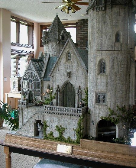 Magical Miniatures | Pop Goes the Page Harry Potter Dolls House, Doll House Castle, Harry Potter Dollhouse, Hogwarts Miniature, Hogwarts Dollhouse, Green Dollhouse, Potter House, Haunted Dollhouse, Hogwarts Castle