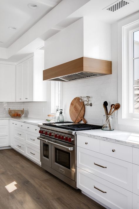 Kitchen mixed shaker and flat front cabinetry with Kitchen 2x10 White Gloss Subway Tile backsplash and Rift Oak Kitchen Hood Trim #Kitchen #kitchencabinet #shakerkitchencabinet #flatkitchencabinetry #WhiteGlossSubwayTile #SubwayTile #backsplash #RiftOak #KitchenHood White Range Hood, Kitchen Hood Design, Transitional Kitchen Design, White Range, Kitchen Hoods, Oak Kitchen, Kitchen Views, Transitional Kitchen, Wood Trim