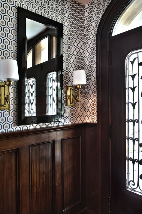 Si & Oui created this small but bold entryway with 4 simple design elements - Cole & Sons Hicks' Hexagon wallpaper, Feiss wall sconces, an inexpensive mirror, and rich mahogany paneling. This is a perfect example of great design at an exceptional price.  #Neutral #InteriorDesign #Decor #Entryway Dark Entryway, Bold Entryway, Neutral Entryway, Mahogany Paneling, New Front Door, Hexagon Wallpaper, Entryway Mirror, Decor Entryway, Front Entrance