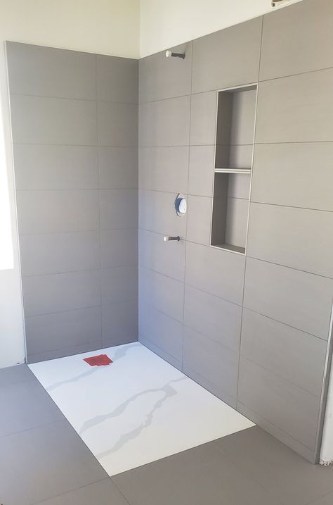 Curbless shower with modern style. 12x24 tile on walls with 24x24 on the floor. Double stacked niche. Stacked 12x24 Shower Tile, 24x24 Tile Shower Walls, Shower Tile 12x24, 12 X 24 Tile Bathroom Shower Walls, 24x24 Floor Tile, 12x24 Tile Patterns Shower Walls, Stacked Tile Shower Wall, 12x24 Shower Wall Tile, Inspirational Bathrooms