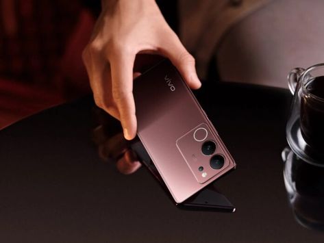 After weeks of rumors and leaks, Vivo has finally launched its V29 series of smartphones in India. There are two models in the lineup: the V29 and the V29 Pro. Here are all the details about both devices, which feature a few similar specifications but some distinct differences. Vivo V29: The new Vivo V29 will […] The post <a rel="nofollow" href="https://www.mytechnewsindia.com/2023/10/vivo-v29-vivo-v29-pro-featuring-50mp-selfie-sensor-1-5k-amoled-display-launched-in-india.html... Vivo V29, Mobile Library, Two Models, Mobile Technology, Camera Phone, Mobile Design, Dual Band, News India, Tech News