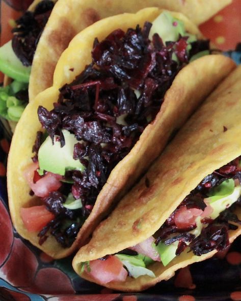 Crispy hibiscus tacos -- tacos dorados de jamaica Hibiscus Recipes Food, Jamaica Tacos Recipe, Hibiscus Tacos Recipe, Hibiscus Flower Recipes Food, Vegan Hibiscus Recipes, Roselle Hibiscus Recipes, Hibiscus Tacos, Hibiscus Food, Jamaica Flower Recipes