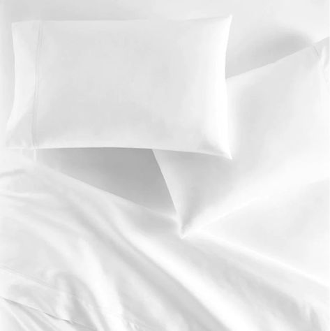 Is white bedding a good or bad choice for your bedroom? This article reviews the pros and cons of white sheets, white pillow shams, and white duvet covers. We cover our bestselling white bedding styles, go over how to keep white bedding white, and explore our favorite non-white neutral bedding. Bedding White, Peacock Alley, Neutral Bedding, White Sheets, White Duvet Covers, White Duvet, White Pillow, Chic Bedroom, White Bedding