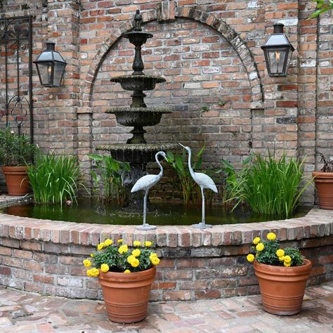 Brick French Quarter courtyard has plenty to keep its owner next to nature | Entertainment/Life | nola.com Small French Country House, European Courtyard, Succulent Fountain, Japanese Magnolia Tree, New Orleans Courtyard, Gardenia Trees, French Country Houses, French Courtyard, Brick Courtyard