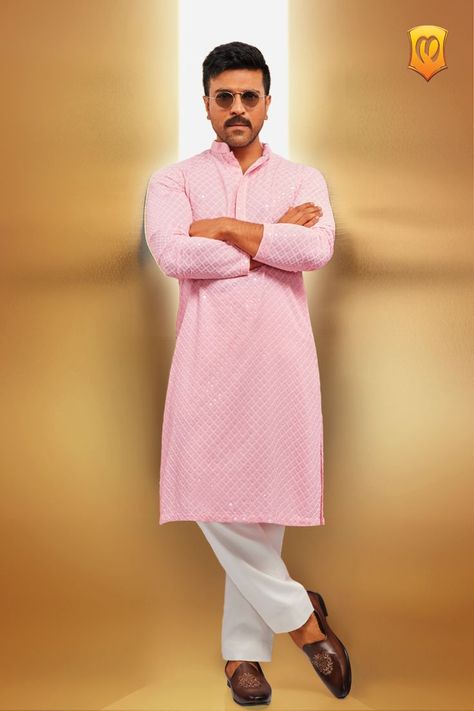 Ram Charan looks dashing in an exquisite flamingo pink kurta set, where traditional Chikankari embroidery seamlessly intertwines with enchanting harlequin patterns, all accentuated by the shimmering sequin work. Get ready to steal the show at any special occasion. Indian Wear For Men, Wedding Dress For Men, Wedding Suits For Men, Mens Indian Wear, Chikankari Embroidery, Pink Kurta, Kurta For Men, Ram Charan, Harlequin Pattern