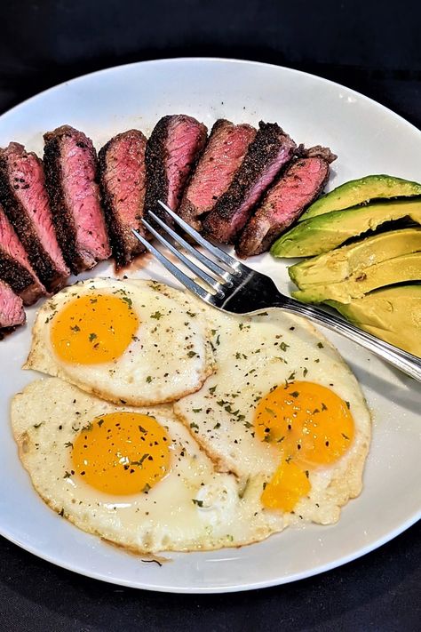 Enjoy a low-carb, keto-friendly, nutritious, and hearty breakfast in just 15 minutes! Learn the tips to a perfectly cooked steak and beautiful sunny side up eggs and get the recipe on my blog at www.ImpressNotStress.com 0 Carb Foods, Breakfast Steak And Eggs, Keto Steak, Steak Eggs, New York Strip Steak, Steak Breakfast, Healthy Eating Inspiration, New York Strip, Eggs Breakfast