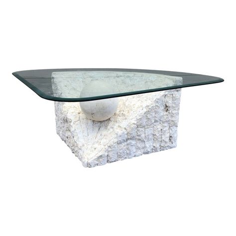 Vintage Tessellated Mactan Stone Triangular Coffee Table. Mactan stone, which forms the base of this coffee table, is a sedimentary conglomerate of shale and coral. Resting atop the Mactan stone base is a travertine orb which, along with the Mactan stone, holds the triangular glass top.   Made in the style of Maitland-Smith. Tessellated Stone Coffee Table, Coffee Table Glass, Stone Coffee Table, Table Glass, Mid Century Coffee Table, Stone Dining Table, Glass Top Coffee Table, Unique Tables, Cast Stone