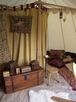 The living room in the tent -- really shows what you can do to make a large tent seem more like a home.  I have got to find myself a chest like that. Tent Interior, Medieval Furniture, Large Tent, Campaign Furniture, Camp Furniture, The Ceiling, My New Room, Tent Camping, Larp