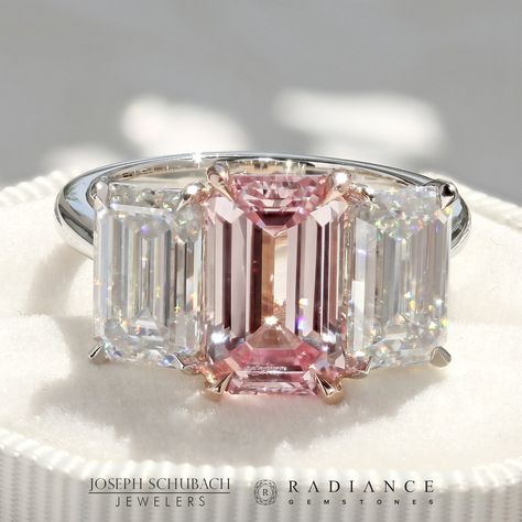 A Joseph Schubach design. This three stone emerald cut ring features a 3 1/2ct Radiance® Pastel Pink emerald cut lab grown sapphire and two Radiance® Premium emerald cut moissanites weighing 3.4ct total (diamond equivalent). The setting is crafted in 14kt rose gold and platinum. Contact us for additional info or to make this with different stones. Pink Emerald Cut Engagement Ring, Three Stone Emerald Cut Ring, Fancy Pink Diamond Ring, Damascus Steel Wedding Band, Dig Jewelry, Pink Rings, Ring Leader, Pink Diamonds Engagement, Meteorite Wedding Band