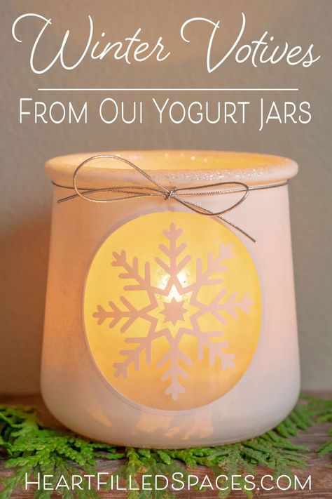 This cute little votive craft idea will add some warmth and fun to your home this winter. Reuse those glass yogurt jars and make something special this holiday season. Includes step by step instructions with free printables/cut files. #holidaycrafts #diy #votives #jar #oui #wintercrafts #upcycle Oui Yogurt Jars Ideas Diy Christmas, Oui Jars Repurpose Christmas, Oui Crafts, Oui Yogurt Jars Ideas, Oui Jars, Oui Yogurt, Yogurt Jars, Crafts With Glass Jars, Snowflake Craft