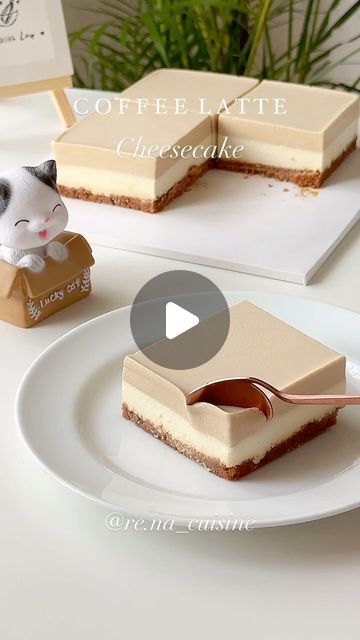 Rennie 🕊 on Instagram: "Let’s make a coffee latte cheesecake as i got a new coffee maker from @siroca.idn 🤎 look ar the design! It’s so pleasingly aesthetic and minimalist 🥰 it’s making my coffee time more enjoyable 🤎🤭 Recipe: Biscuit base (lotus biscoff crumbs 120gr, melted butter 50gr) Cheesecake: 200gr cream cheese 50gr sugar 30gr milk 8gr gelatin 130gr whipping cream (whipped until yogurt texture) 50gr coffee liquid How to : 📌mix buscuit crumbs and melted batter, and put in square mold 📌 mix together cream cheese and sugar using spatula until creamy 📌 mix bloomed gelatin into warm milk, and add to cream cheese mixture Mix well 📌add whipped cream and mix well 📌 put half of the batter on top of the biscuit base, and freeze for 20 mins 📌 add coffee liquid to the rest of the bat Cheese Cakes Design, Biscuit Base Recipe, Cheesecake Aesthetic, Cheesecake Squares, Coffee Cheesecake, Batter Mix, Lotus Biscoff, Easy Cheesecake Recipes, Easy Coffee