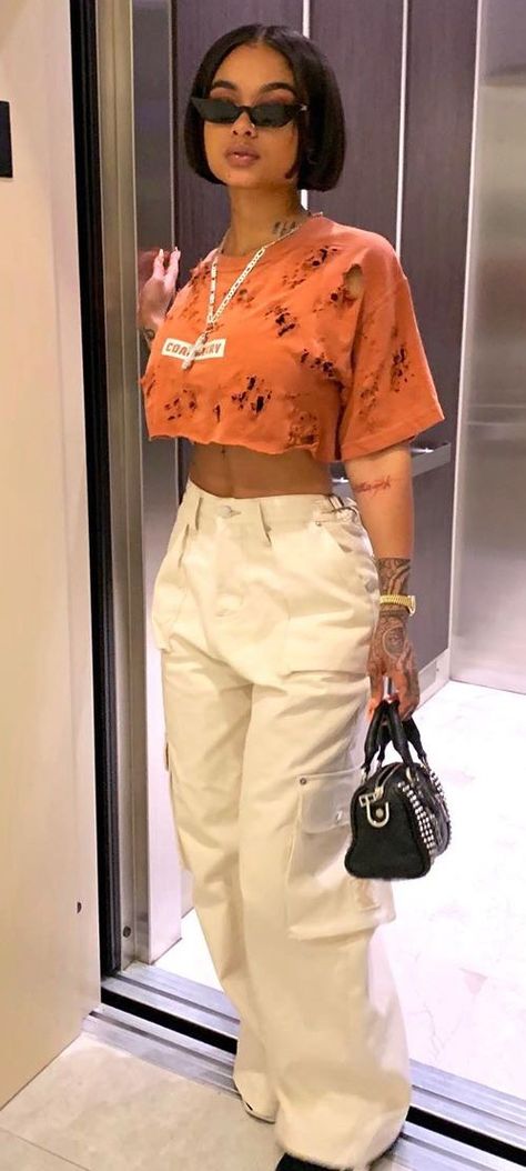 Cargo Pants And Cropped Top, Cargo Pant And Crop Top, Cargo Pants Outfit Crop Top, Crop Top And Baggy Pants Outfit, Oversize Crop Top Outfit, Crop Top With Baggy Pants, Orange Top Outfit Black Women, Tom Boy Summer Outfits, Tom Boy Outfits Black Women