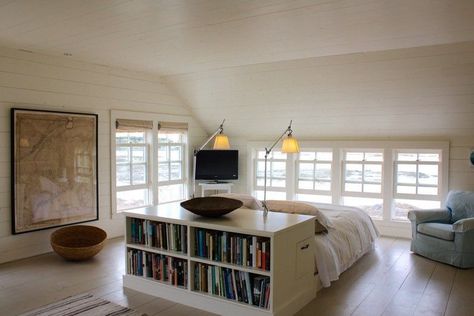 This former general store is now a gorgeous ocean-front cottage - Cottage Life Bed Floating In Center Of Room, Bed In Front Of Dormer Window, Bed In Middle Of Room Ideas, Bed In Center Of Room, Bed Facing Window, Centered Bed, Bed In Middle Of Room, Wall Headboard, Storage Ikea