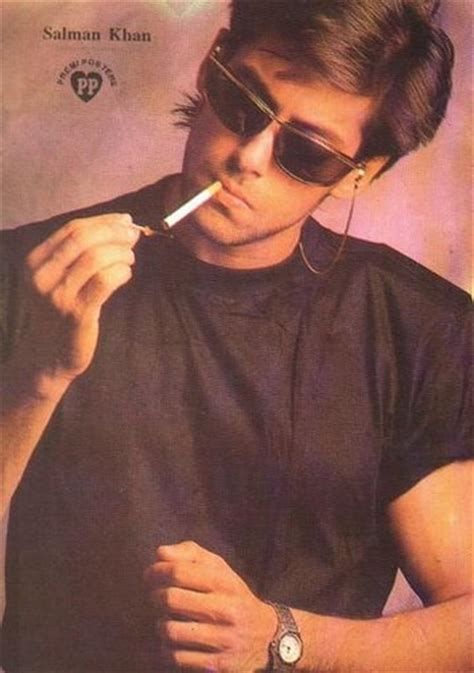 Salman Khan- Bhai smoking, now Sallu smoked for a lot of years but then because of an health issue with nerve damage decided to voluntarily kick the habit in 2012 & he was even successful at it for a couple of years.However unfortunately he took up smoking again in 2016 & hasn't stopped since then. People who are extremely intelligent, laser focused, high strung or highly energetic usually find that smoking cigarettes helps to both soothe & to relax them, so maybe that's why Sallu smokes. Salman Khan Quotes, Salman Khan Young, Actor Bollywood, Salman Khan Wallpapers, High Strung, Gym Photoshoot, Retro Photoshoot, Bollywood Retro, 90s Bollywood Aesthetic