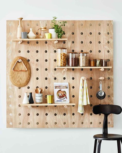 space-saver-peg-board-103085273-onecms Paper Helmet, Pegboard Kitchen, Wooden Pegboard, Kitchen Wall Units, Stackable Plastic Storage Bins, Pegboard Display, Pan Storage, Stackable Bins, Paper Furniture