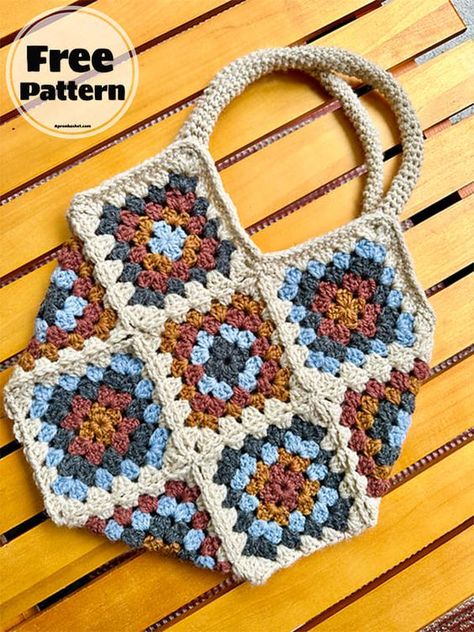 The best way to use the extra yarn you have is a crochet granny square bag. There is a video tutorial on the designer’s website that shows you in detail how to make this wonderful and easy crochet granny square bag pattern. A great option for those who want to make an easy granny square bag. These granny squares have become very popular lately and I’m excited to see these motifs on a bag. This wonderful crochet granny square bag pattern, which will make beginners love crocheting, is now below for you. Granny Square Crochet Bag Pattern, Crochet Granny Square Bag Pattern Free, Granny Square Bag Layout, Granny Square Bag Pattern Free, Granny Square Bags, Crochet Bags Free Patterns, Granny Square Bag Pattern, Crochet Granny Square Tote Bag, Easy Crochet Granny Square