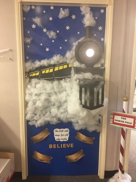 We are having a Christmas door decorating contest at work 🚂 I just finished my door, The Polar Express is my favorite movie.   Credits: Pinterest for the idea, Dollar Tree for glitter snowflake stickers, black foam board & poster board, Walmart for black spray pain, styrofoam, spray snow & touch light, Hobby Lobby for poly-fill & blue wrapping paper. Christmas Door Decorations For School Polar Express, Door Competition Decorating Ideas Christmas, Door Decorating Contest For Christmas, Starwars Christmas Door Decorations, The Polar Express Classroom Door, Door Competition Decorating Ideas, Winter Wonderland Door Contest, Decorate Office For Christmas Cute Ideas, Award Winning Christmas Door Decorations