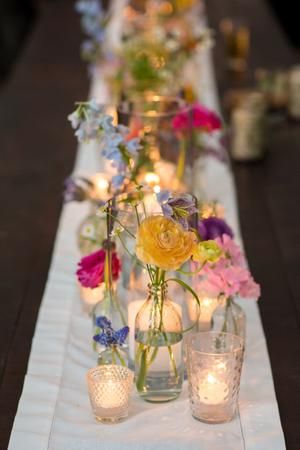 Unusual Wedding Decorations, Colorful May Wedding, Wildflower Rehearsal Dinner, Wild Flower Wedding Theme Ceremony Decor, Summer Floral Arrangements Wedding, Simple Wildflower Centerpieces, Whimsical Garden Wedding Centerpieces, Elegant Wildflower Wedding, Diy Wedding Candle Holders