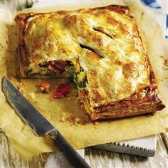 Roast vegetable and houmous pie recipe by Angela Boggiano. The sweet potato layer in this vegetarian pie base absorbs the steam released from the baking vegetables, thereby keeping the pastry crisp.