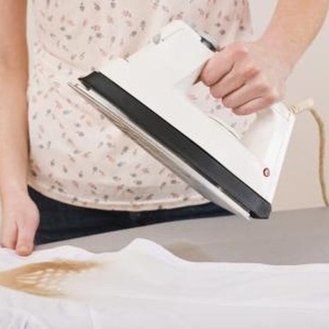 It's easy to remove burn marks like these. Iron Burn On Clothes How To Remove, Iron Burn, Cleaning Tips And Tricks, Stain On Clothes, Coastal Dining, Laundry Room Remodel, Burn Mark, Interiors Magazine, Room Remodel