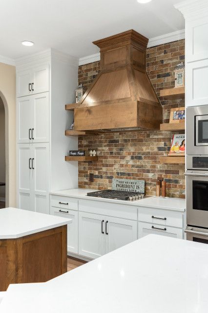 Oldenwood - Farmhouse - Kitchen - Dallas - by RJ Aldriedge Companies Inc. | Houzz Painted Brick Backsplash, White Brick Backsplash, Farmhouse Kitchen Backsplash Ideas, Brick Backsplash Kitchen, Blue Kitchen Island, Farmhouse Kitchen Backsplash, Wood Range Hood, Farmhouse Backsplash, Shaker Style Cabinets