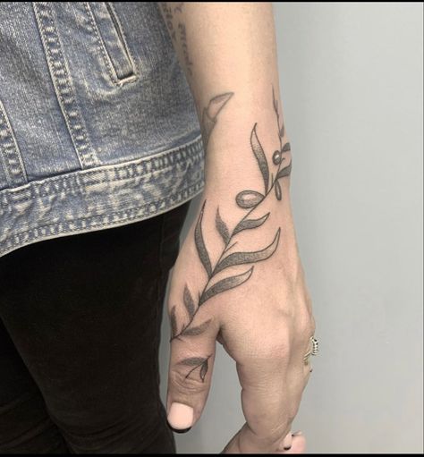 Olive branch wrapped around thumb and then going up the hand towards the elbow. Branch Hand Tattoo, Hand Tattoo Cover Up, Ankh Tattoo, Olive Branch Tattoo, Traditional Tattoo Flowers, Tattoos To Cover Scars, Branch Tattoo, Tattoo Cover-up, Hand Tattoo