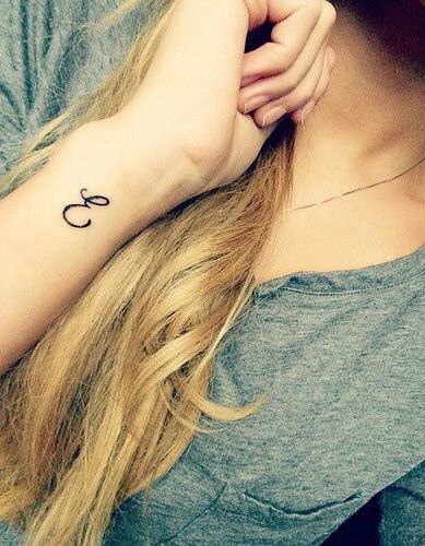 60+ Amazing E Letter Tattoo Designs and Ideas | Body Art Guru Initial Tattoo Placement, Initial Tattoo Designs, Viking Rune Tattoo, Quote Tattoos Girls, Biker Tattoos, Small Tattoo Ideas, Angel Tattoo Designs, Initial Tattoo, E Tattoo