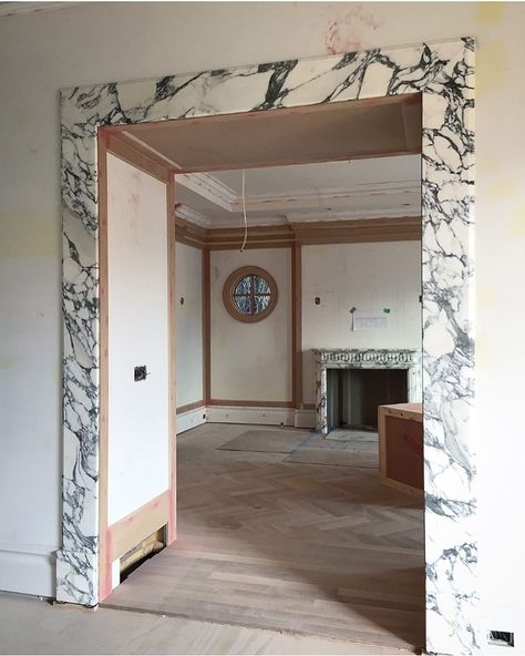 Nam Dang-Mitchell Design on Instagram: “OMG so excited about these marble archways! Happy coincidence that the marble matches the antique fireplace perfectly. #aldredresidence…” Marble Doorway, Nam Dang Mitchell, Hotel Lobby Design, Arch Doorway, Marble Arch, Arch Interior, Antique Fireplace, Tv Wall Unit, Tudor House