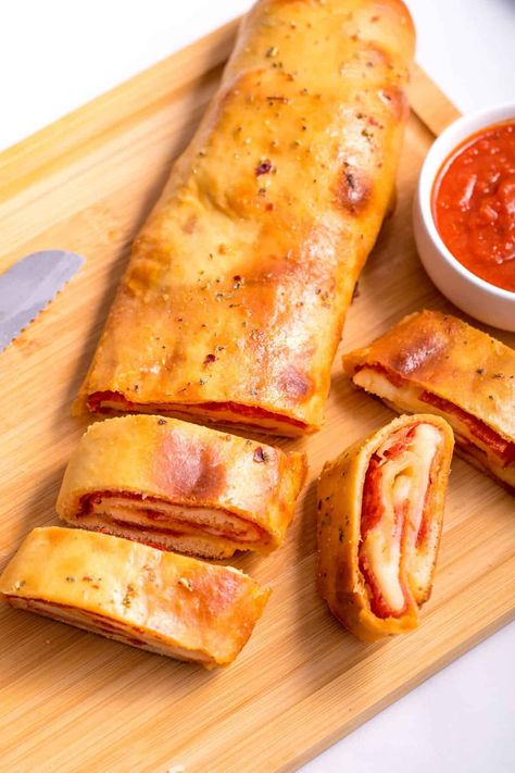 Pepperoni bread is always a crowd-pleaser. With pepperoni, loads of Italian seasoning, and cheese, you really can't go wrong. Pepperoni Cheese Rolls, Pepperoni Cheese Bread, Pepperoni Bread Recipe, Pepperoni Rolls Recipe, Homemade Pepperoni, Pepperoni Bread, Pepperoni Recipes, Pizza Bread Recipe, Pepperoni Rolls