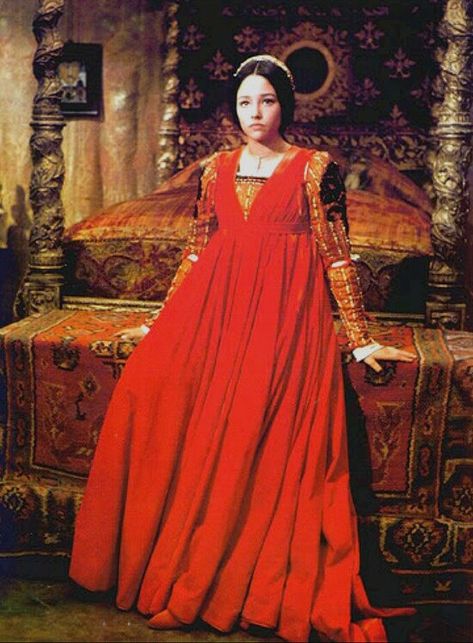 https://flic.kr/p/e23CCh | Red | The incredible Olivia Hussey in Franco Zeffirelli's Romeo & Juliet, 1968. The dress is a Danilo Donati design to represent the 1460s.  Searching through stuff to research my PowerPoint lectures I ran across some really interesting items online that were all red, like the purple things I found yesterday. I am sharing them with you all. Romeo And Juliet 1968, Romeo And Juliet Costumes, Zeffirelli Romeo And Juliet, Juliet 1968, Juliet Capulet, Olivia Hussey, Period Outfit, Costume Drama, Red Gowns