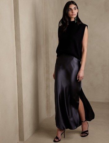 5 Satin Midi Skirt Outfits to Wear this Winter | Le Chic Street Silk Maxi Skirt Outfit, Satin Midi Skirt Outfits, Black Satin Skirt Outfit, Silk Skirt Outfit, Long Silk Skirt, Silk Slip Skirt, Satin Skirt Outfit, Black Silk Skirt, Charmeuse Fabric