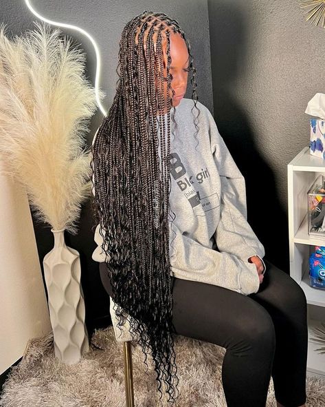 Black girl wearing long small sized bohemian box braids hairstyle. Small Bohemian Box Braids, Medium Long Knotless, Braids Ideas For Black Women, Box Braids Ideas, Braids Hairstyles For Black Women, Box Braids Bun, Black Box Braids, Quick Braids, Weave Hairstyles Braided