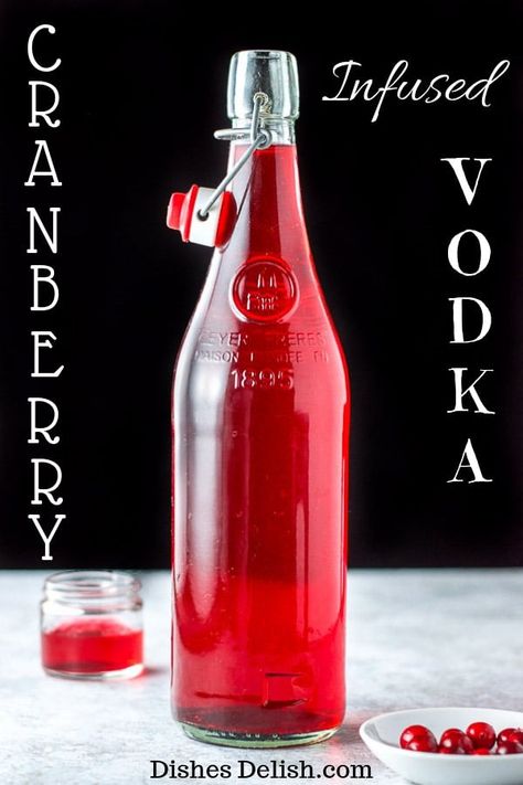 This cranberry infused vodka is delightfully tart!  There is no added sugar because I believe it should be added to the cocktail and not the vodka!!  It's vibrant and delicious! #vodka #cranberry #cranberryvodka #dishesdelish  via @dishesdelish Moonshine Drinks, Infused Spirits, Making Alcohol, Homemade Liqueur, Fruity Cocktail Recipes, Homemade Liquors, Cocktails Vodka, Vodka Cranberry, Alcohol Infusion