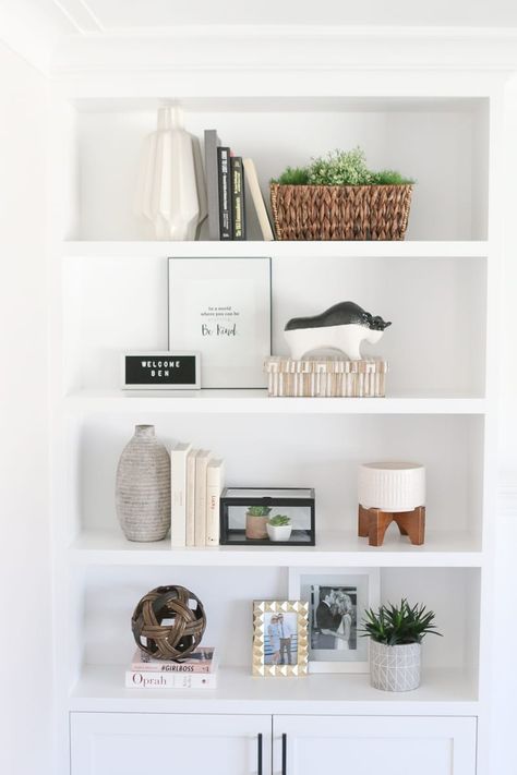 The Dos and Don'ts of Decorating Built-In Shelves | The DIY Playbook Accessorizing Shelves, Decorating Built In Shelves, Styled Shelves, Styling Bookshelves, Shelf Decor Living Room, Styling Shelves, Decorating Bookshelves, Bookcase Decor, Interior Decorating Styles