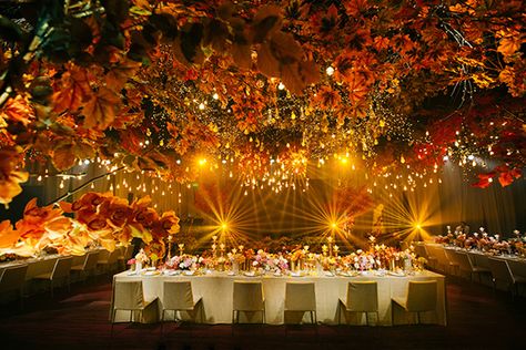 An Elegant Wedding with an Orange and Black Color Scheme | https://brideandbreakfast.ph/2019/10/12/an-elegant-wedding-with-an-orange-and-black-color-scheme/ Burnt Orange And Yellow Wedding, Gold And Orange Wedding, Black Gold Burnt Orange Wedding, Yellow And Orange Wedding Decor, Black And Orange Themed Wedding, Black And Orange Backdrop, Orange Curtain Backdrop With Lights, Amber Uplighting Wedding, Reception Ceiling